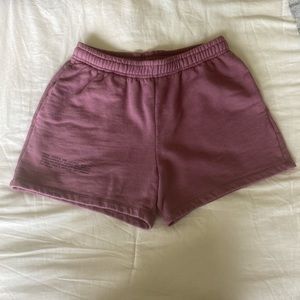 Pangaia purple shorts.